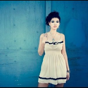 * Nude dress with black trim